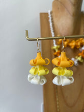 Triple Puakenikeni earring